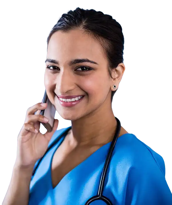 Nurse talking with an older adult at home.